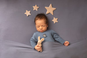 Newborn boy photoshoot in Strood Kent. Baby boy with stars and bunny teddy 
